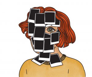 Girl with poloroid blank pictures covering most of her face.